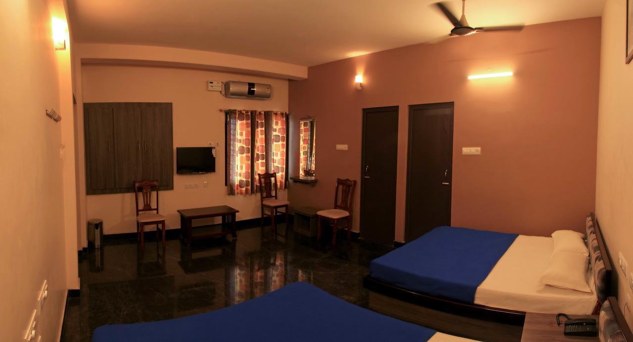 Hotel Sri Hayagriva Tiruchirappalli Oda fotoğraf